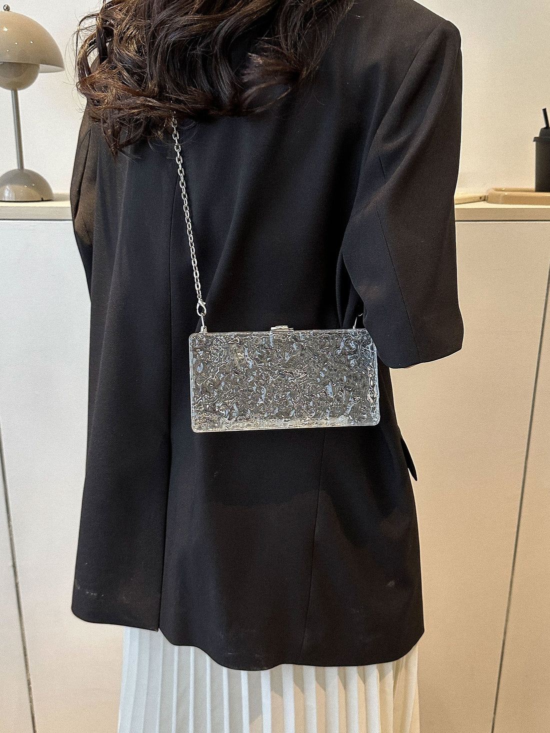Stay stylish this summer with our Chic Clear Chain Crossbody Bag, the must-have accessory for women. The clear chain design adds a touch of sophistication to any outfit while keeping your essentials within reach. Upgrade your summer wardrobe with this perfect accessory.