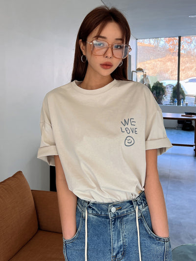 Empowerment in Print: Slogan Graphic Drop Shoulder Tee