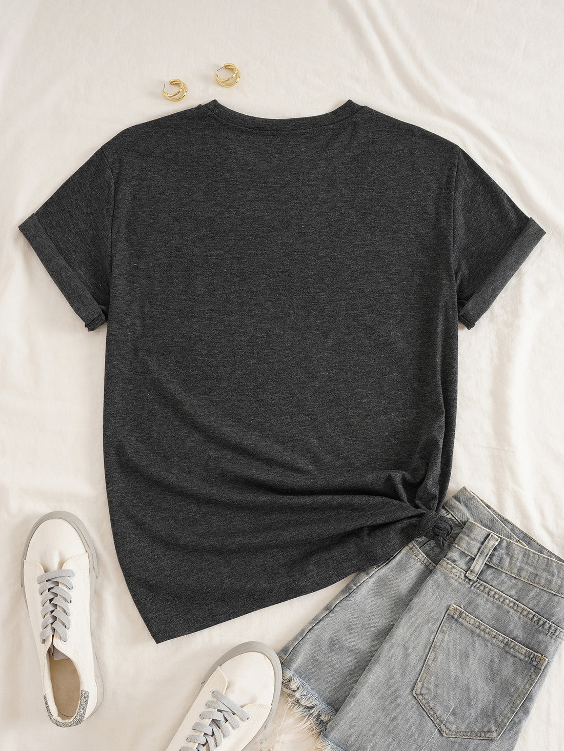 Spread some colorful positivity with this 'Don’t Let Ruin Your Day' tee! Featuring a vibrant graphic and playful message, this tee will remind you to stay positive and not let anything ruin your day. Stay stylish and positive with this quirky tee.