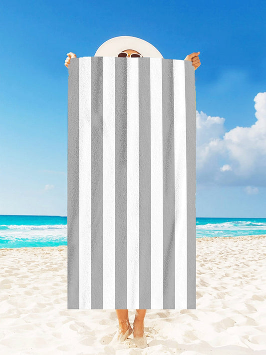 Introducing the Modern Two-Tone Striped <a href="https://canaryhouze.com/collections/towels?sort_by=created-descending" target="_blank" rel="noopener">Beach Towel</a> - your essential outdoor travel companion. With its stylish design and durable material, this towel is perfect for both beach trips and camping adventures. Made with high-quality fabric, it provides maximum absorbency and is quick-drying. Don't leave home without it.