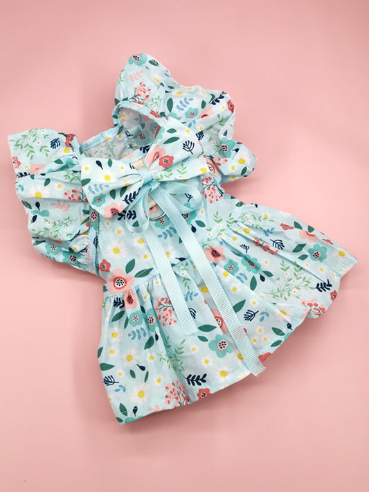 Dress up your furry friend in style with Pretty in Petals: Floral Print Pet Dress with Bow. Featuring a beautiful floral print and a charming bow detail, this dress adds a touch of elegance to your pet's wardrobe. Made with high-quality materials, it offers both comfort and fashion for your beloved companion.