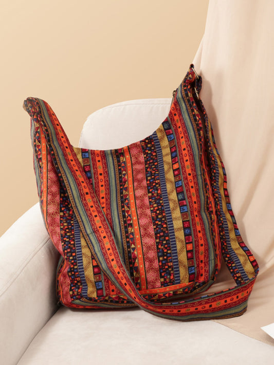 With a bohemian chic vintage design, this crossbody <a href="https://canaryhouze.com/collections/canvas-tote-bags?sort_by=created-descending" target="_blank" rel="noopener">bag</a> is the perfect accessory for school, work, and weekend adventures. Made with sturdy canvas, it is durable and stylish. Stay organized with multiple compartments, and travel comfortably with the adjustable strap.