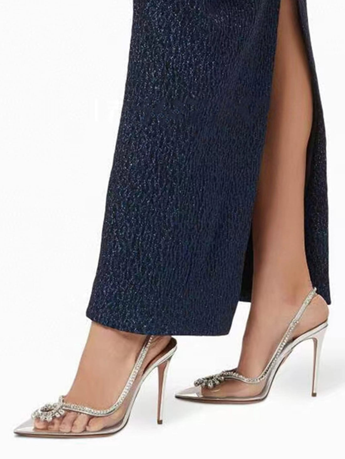 Elevate your party look with these dazzling Rhinestone Slingbacks. The clear PVC <a href="https://canaryhouze.com/collections/women-canvas-shoes?sort_by=created-descending" target="_blank" rel="noopener">stiletto heels</a> are adorned with shimmering rhinestones, adding a touch of glamour to any outfit. Perfect for any special occasion, these slingbacks will make you shine.