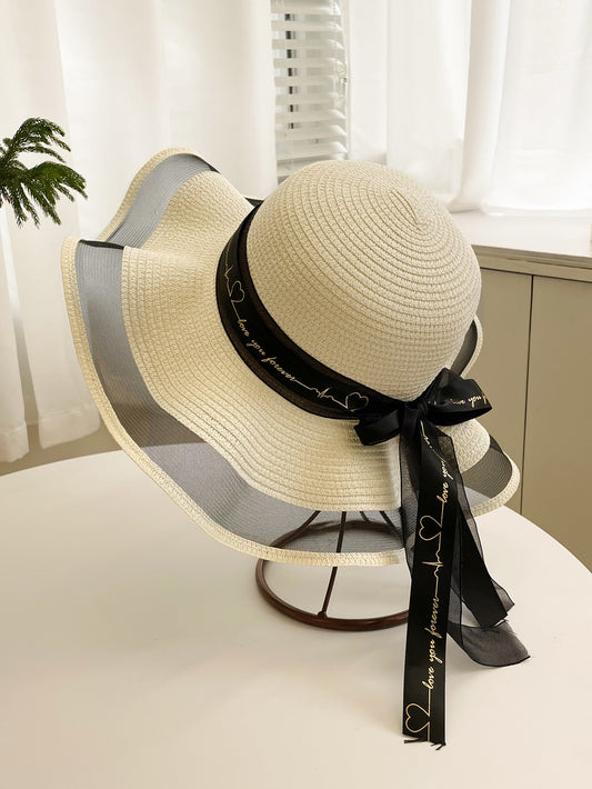 Add a touch of Boho Chic to your wardrobe with our Skinny Scarf Decor Straw Hat. This hat effortlessly combines style and function, featuring a decorative scarf for added flair. Enjoy the perfect blend of fashion and practicality with this must-have accessory.