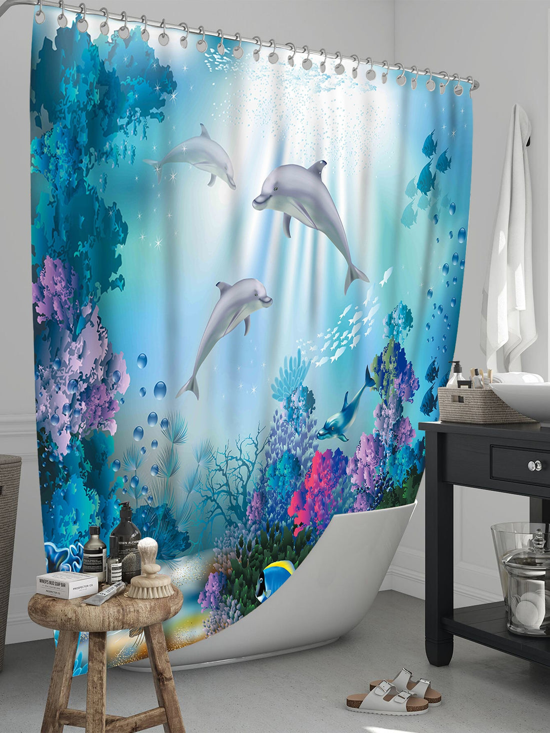 Elevate your bathroom style with our Modern Waterproof Dolphin Shower Curtain. Crafted for both function and fashion, this curtain is designed to keep your bathroom dry while its stylish dolphin print adds a touch of whimsy. With its waterproof material, you can enjoy a worry-free shower experience.