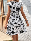 Blooming Beauty: Clasi Floral Print Surplice Neck Dress