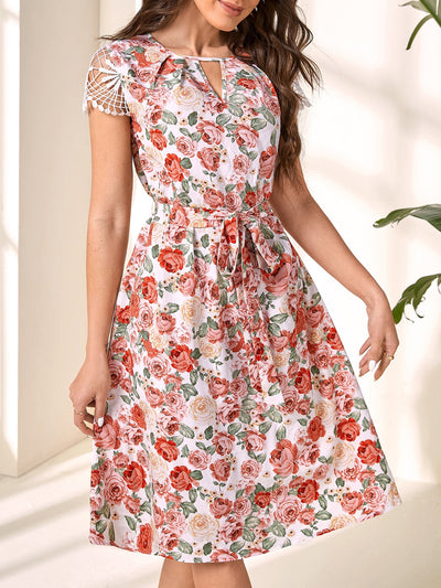 Elevate your style with the Floral Elegance dress. Its keyhole neckline adds a touch of allure, while the guipure lace belt cinches your waist for a flattering silhouette. Embrace the elegant floral print and feel confident in this expertly crafted, sophisticated dress.