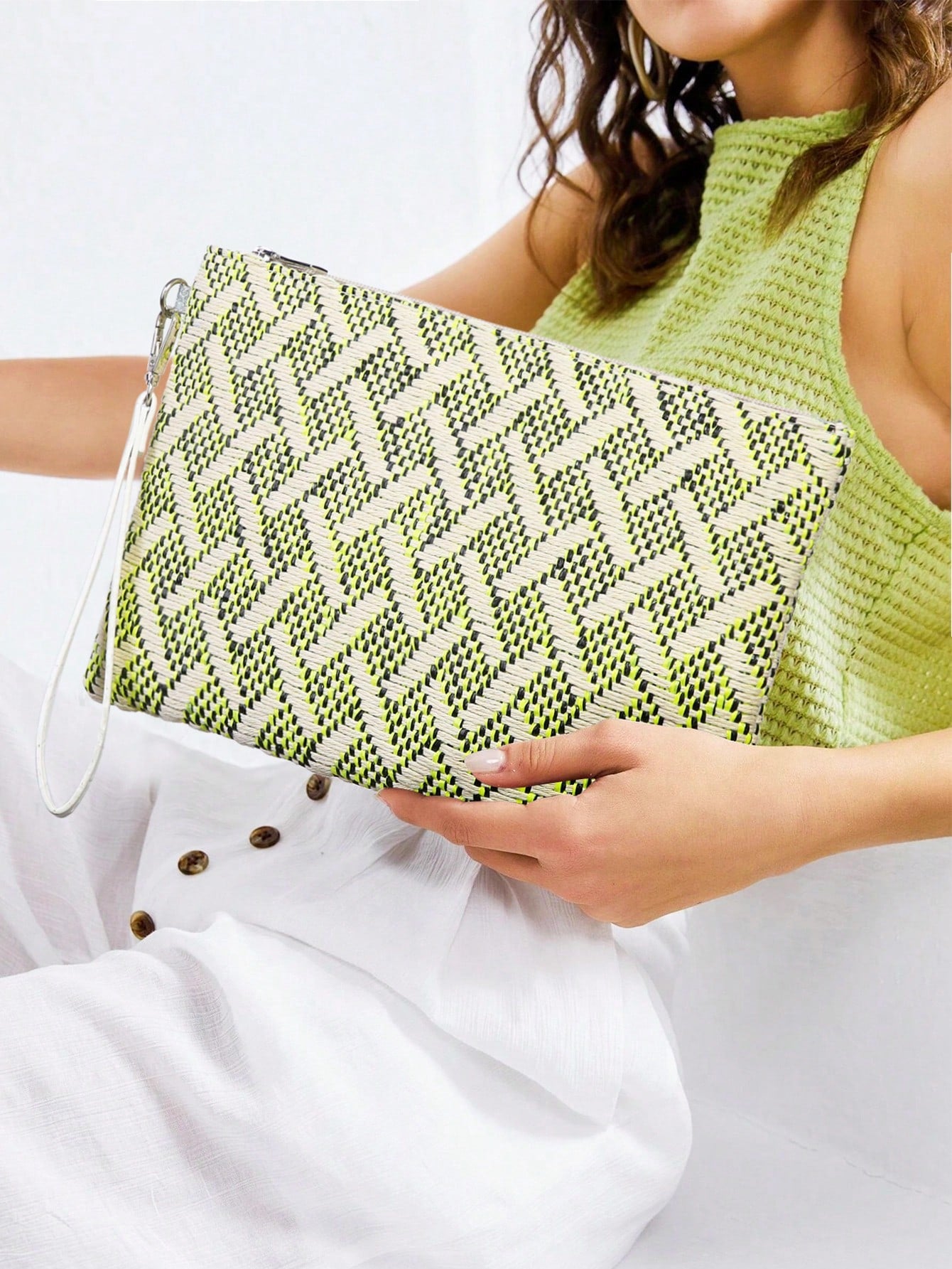 Stay stylish on your next vacation with our Colorblock Medium Straw Wristlet Bag. Combining functionality and fashion, this bag is your perfect companion for your travels. With its colorblocked design and wristlet feature, it's both chic and practical. Don't leave for your trip without it!