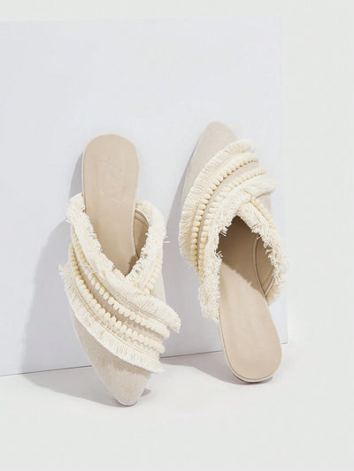 Bohemian Bliss: Beige Pom Pom Ruffle Flats for Vacation Chic