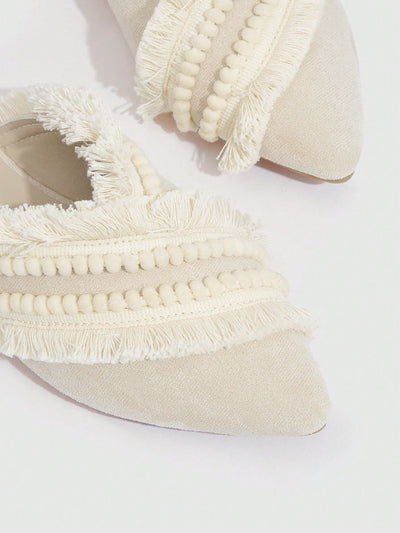 Bohemian Bliss: Beige Pom Pom Ruffle Flats for Vacation Chic