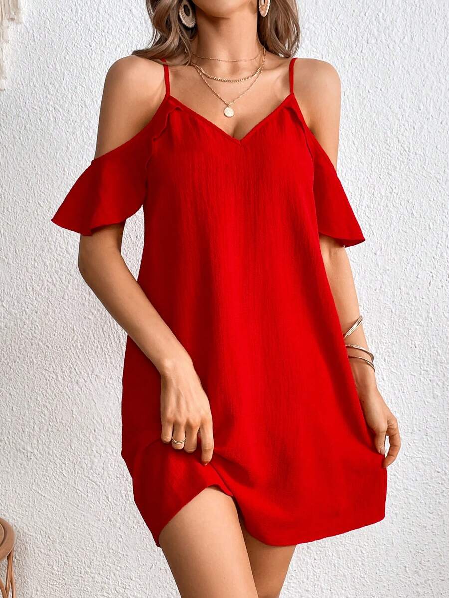 Front view of red cold shoulder mini dress with spaghetti straps and flutter sleeves