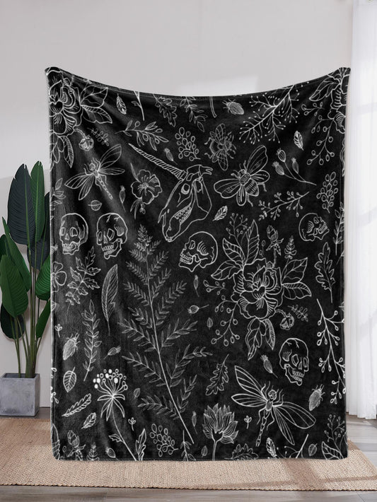 Cozy up with the Skull Plant Pattern Blanket, the perfect home decor essential for both style and comfort. Made with a soft and warm material, this blanket features a unique and trendy skull plant pattern. Add a touch of coziness to any room with this must-have piece.