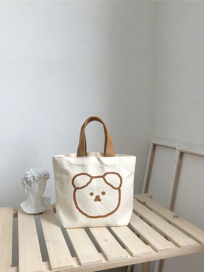 Elevate your lunch experience with our Cute Cartoon Bear Handbag Lunch Box! This adorable handbag is an innovative and stylish way to carry your meals. Made with high-quality materials, it's durable and practical. Plus, its fun design will bring a smile to your face every time you use it.