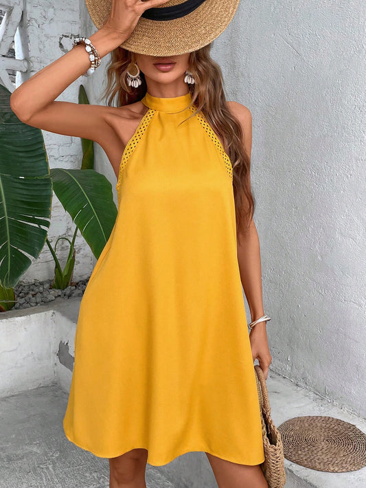 This Classic Solid Tie-Back Halter Neck Tunic <a href="https://canaryhouze.com/collections/women-dresses" target="_blank" rel="noopener">Dress</a> is a versatile and stylish addition to any wardrobe. The tie-back halter neck design adds a touch of elegance, while the classic solid color makes it easy to pair with different accessories. Made with high-quality materials, this dress is comfortable and flattering for any occasion.