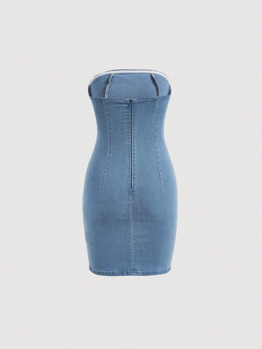 Front view of light-wash blue strapless denim mini dress with fitted shape and twin slits