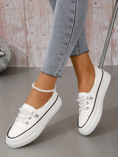 Experience the perfect combination of style and comfort with our Chic and Comfortable Women's Slip-On <a href="https://canaryhouze.com/collections/women-canvas-shoes?sort_by=created-descending" target="_blank" rel="noopener">Shoes</a>. The contrast binding design and lace-up front give these sneakers a sporty look, while the slip-on feature provides convenience. Stay fashionable and comfortable all day with these must-have shoes.