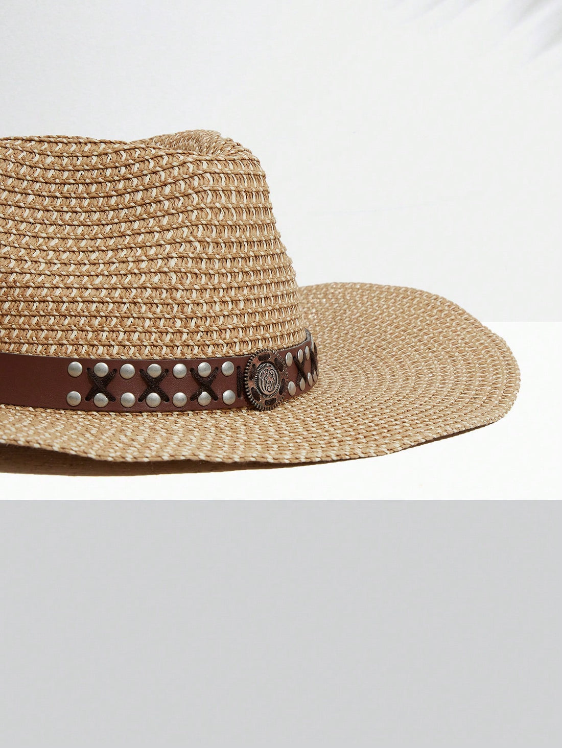 Stay stylish and protected from the sun with our Tape-Studded Decor Straw Cowboy Hat. Perfect for your daily boho life, this hat features a unique tape-studded decoration that adds a touch of style to any outfit. Made with high-quality materials, it provides both fashion and function.