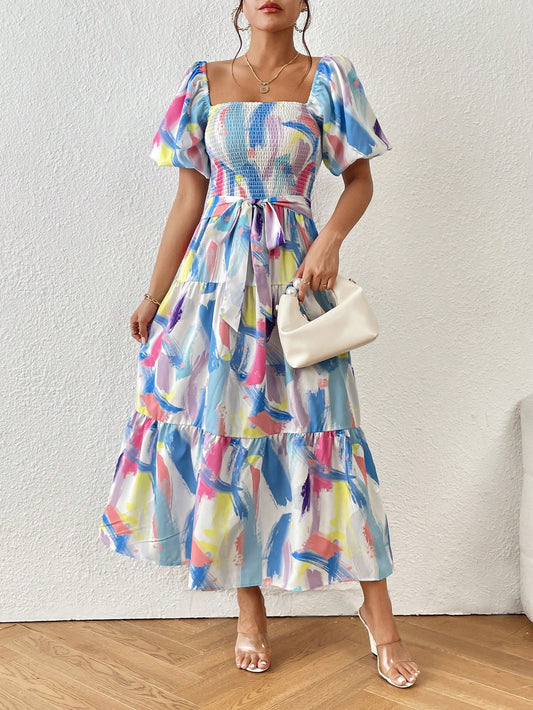 Introducing a must-have for your summer wardrobe: the Brush Print Ruffle Hem Belted Dress. This dress features a unique brush print design and a flattering ruffle hem, while the belt accentuates your waist for a perfect fit. Stay stylish and comfortable all summer long with this essential dress.