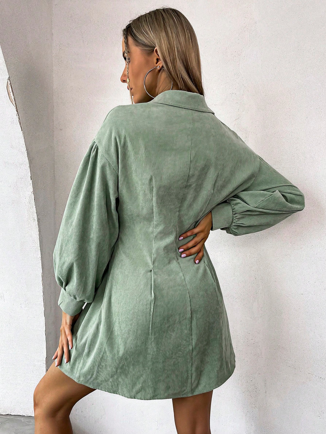 Experience effortless style with our Chic Dual-Pocket Lantern Sleeve Cord Shirt Dress. The unique plicated details and dual pockets add functional and fashionable appeal. Designed with lantern sleeves, this dress is perfect for any occasion. Elevate your wardrobe with this must-have statement piece.