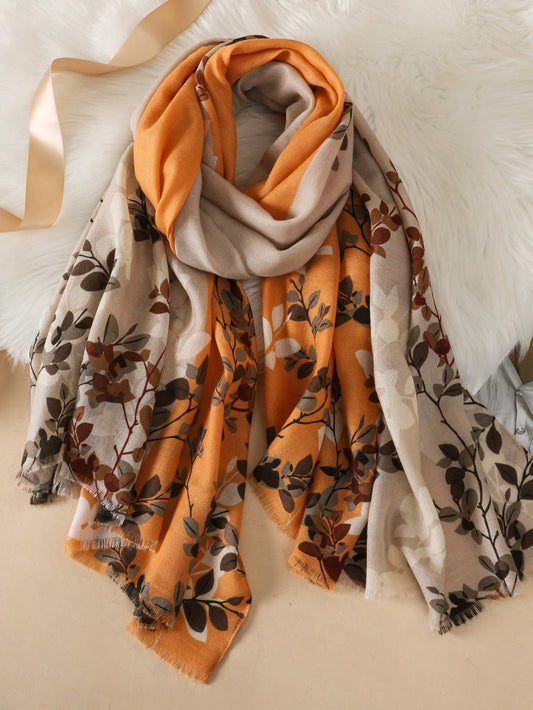 Introducing Boho Delight: the perfect fashion scarf for women! With a vibrant floral pattern and color block design, this scarf adds a touch of bohemian flair to any outfit. Made with high-quality materials, it offers both style and comfort. Elevate your wardrobe with this must-have accessory.