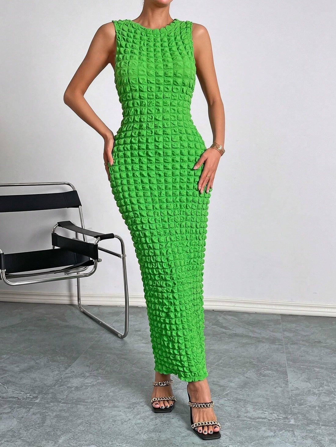 Expertly crafted, the Elegant and Chic: Solid Sleeveless Bodycon Dress effortlessly combines elegance and style. Its sophisticated design features a solid color and a bodycon fit, accentuating your silhouette. Perfect for any occasion, this dress is a must-have for any fashion-forward woman.