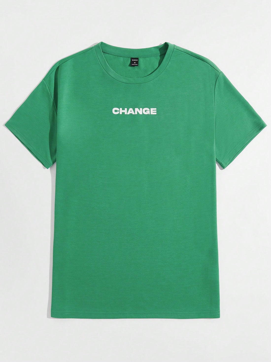 Elevate your street style with our Men's "Change" Letter Graphic Tshirt. Featuring a bold letter design, this shirt is perfect for making a statement. Made with quality materials, it offers both comfort and style. Upgrade your wardrobe and embrace change with this must-have piece.