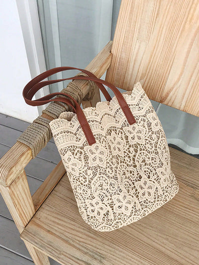 This Lace Flower Design Shoulder Bag is both chic and functional, perfect for busy women on-the-go. The elegant lace flower design adds a touch of sophistication, while the spacious interior and multiple pockets make it practical for everyday use. A must-have for any stylish and efficient woman.