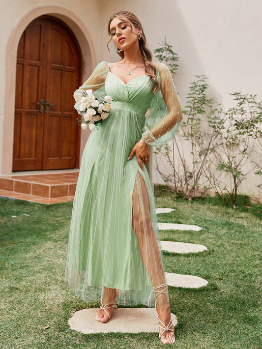 This Mint Green Mesh Magic Lantern Sleeve Dress is expertly designed to provide a unique and stylish look. The dress features a delicate mint green mesh overlay, enhancing the charming lantern sleeves. It is perfect for any occasion, adding a touch of elegance and sophistication to your wardrobe.