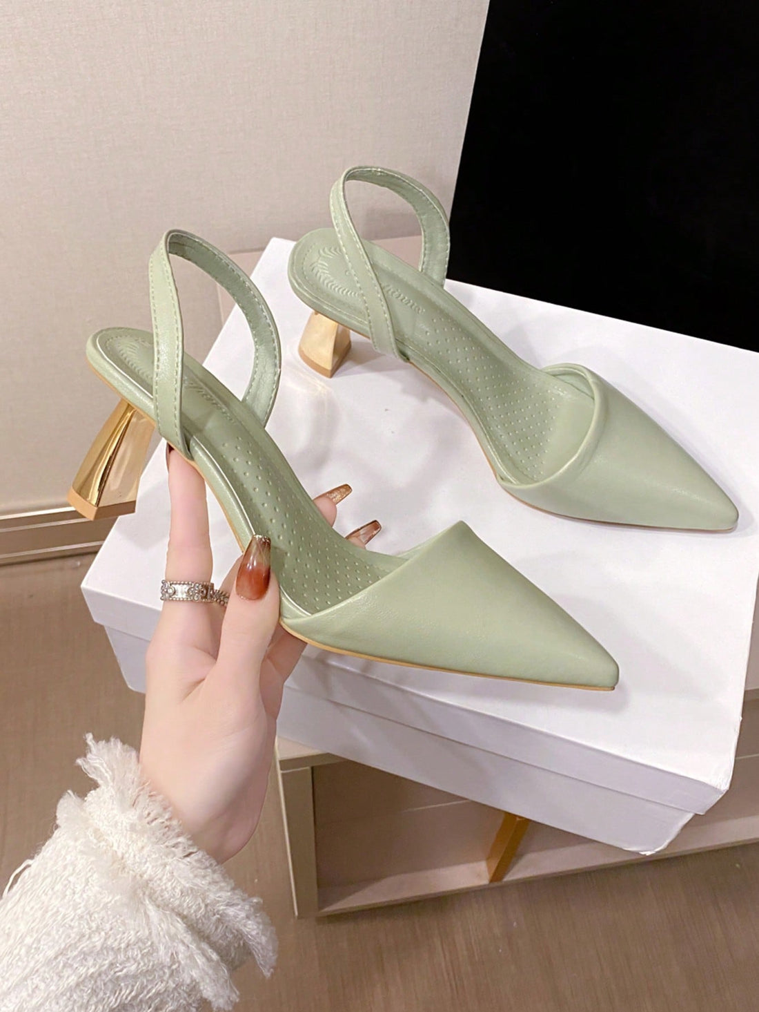 These Sleek Sculptural Slingback Pumps are the perfect combination of sleek and stylish. Featuring a minimalist pointed toe and sculptural design, these heels will elevate any outfit. With a secure slingback strap, these pumps offer both fashion and function. Step out in confidence with these stunning heels.