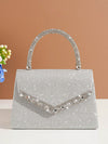 Introducing the perfect accessory for the party perfect bride - the Shimmer and Shine: Glitter Handbag. Made with glimmering glitter, this handbag will add a touch of sparkle to any wedding ensemble. Stay stylish and organized with this must-have bag.