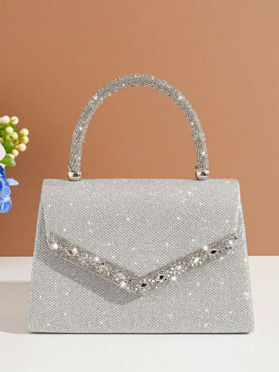 Introducing the perfect accessory for the party perfect bride - the Shimmer and Shine: Glitter Handbag. Made with glimmering glitter, this handbag will add a touch of sparkle to any wedding ensemble. Stay stylish and organized with this must-have bag.