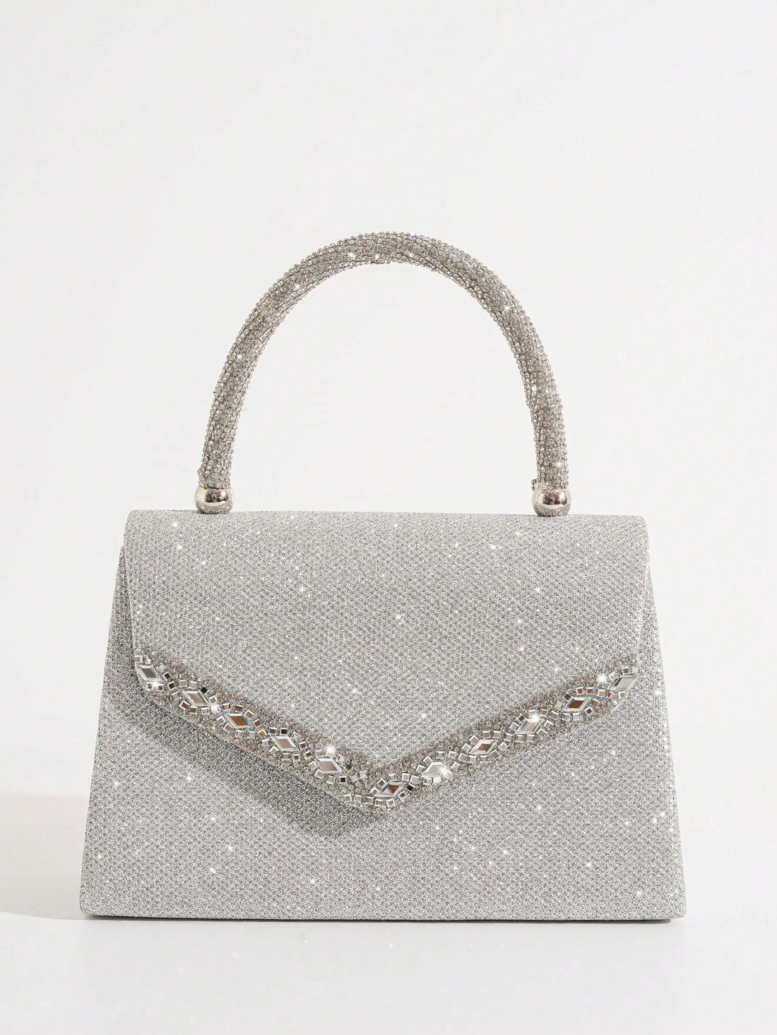 Introducing the perfect accessory for the party perfect bride - the Shimmer and Shine: Glitter Handbag. Made with glimmering glitter, this handbag will add a touch of sparkle to any wedding ensemble. Stay stylish and organized with this must-have bag.