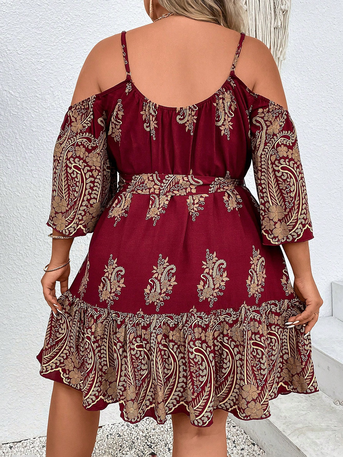 The Chic Plus Size Paisley Print Cold Shoulder Belted Dress is the perfect addition to your wardrobe. With its stylish paisley print and trendy cold shoulder design, this dress is versatile enough for any occasion. The included belt cinches your waist, creating a flattering silhouette. Make a statement and feel confident in this dress!