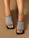 Sparkling Steps: Rhinestone Slide Sandals for Glamorous Women