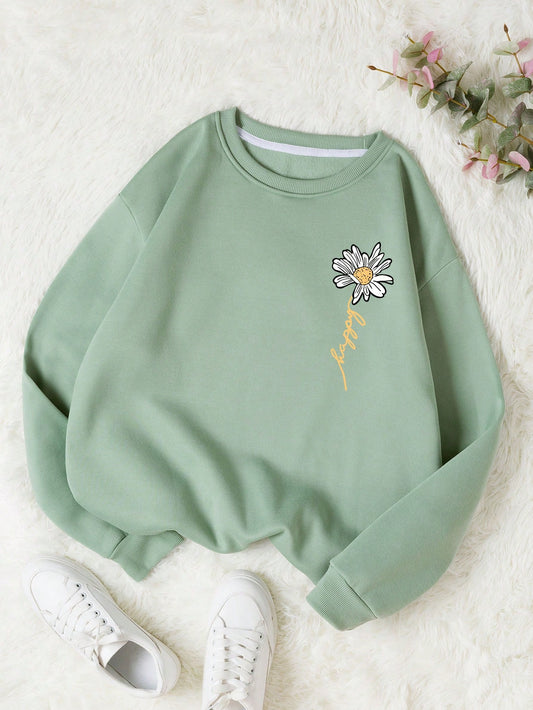 Effortlessly bloom in style with our Floral Letter Graphic Sweatshirt. This unique design combines the beauty of floral patterns with bold letters, creating a statement piece that will elevate any outfit. Made with high-quality materials, this sweatshirt offers both comfort and style. Perfect for any fashion-forward individual.