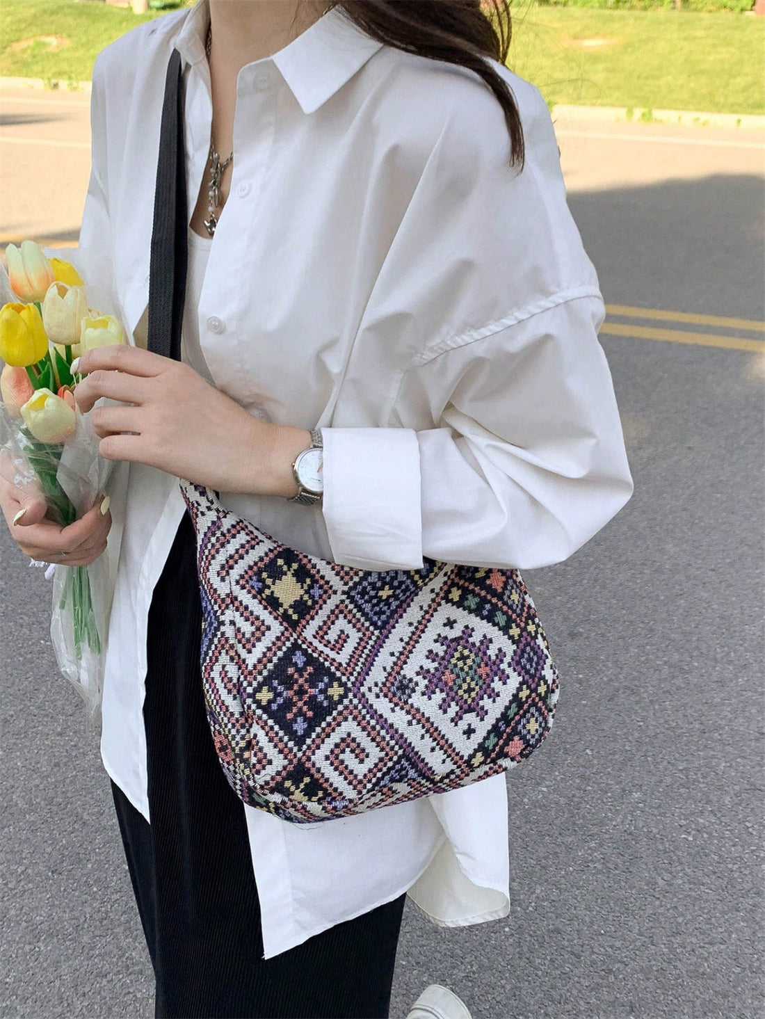 Elevate your bohemian style with our Vintage Geometric Hobo Bag. With its unique geometric design, this bag is not only a fashion accessory but also a statement piece. Made for women who want to add a touch of vintage charm to their look, this bag is the perfect addition to any outfit.