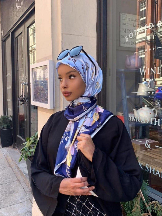 Achieve both style and comfort with our Floral Elegance Satin Turban Head Wrap. Made from soft material, it serves as a versatile chemo hat, headscarf, hijab, cap, and bandana. The elegant floral design adds a touch of sophistication, making it perfect for everyday wear or special occasions.