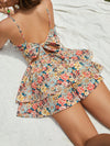 Floral Bliss: Allover Print Backless Cami Romper for Spring Getaways