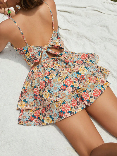 Floral Bliss: Allover Print Backless Cami Romper for Spring Getaways