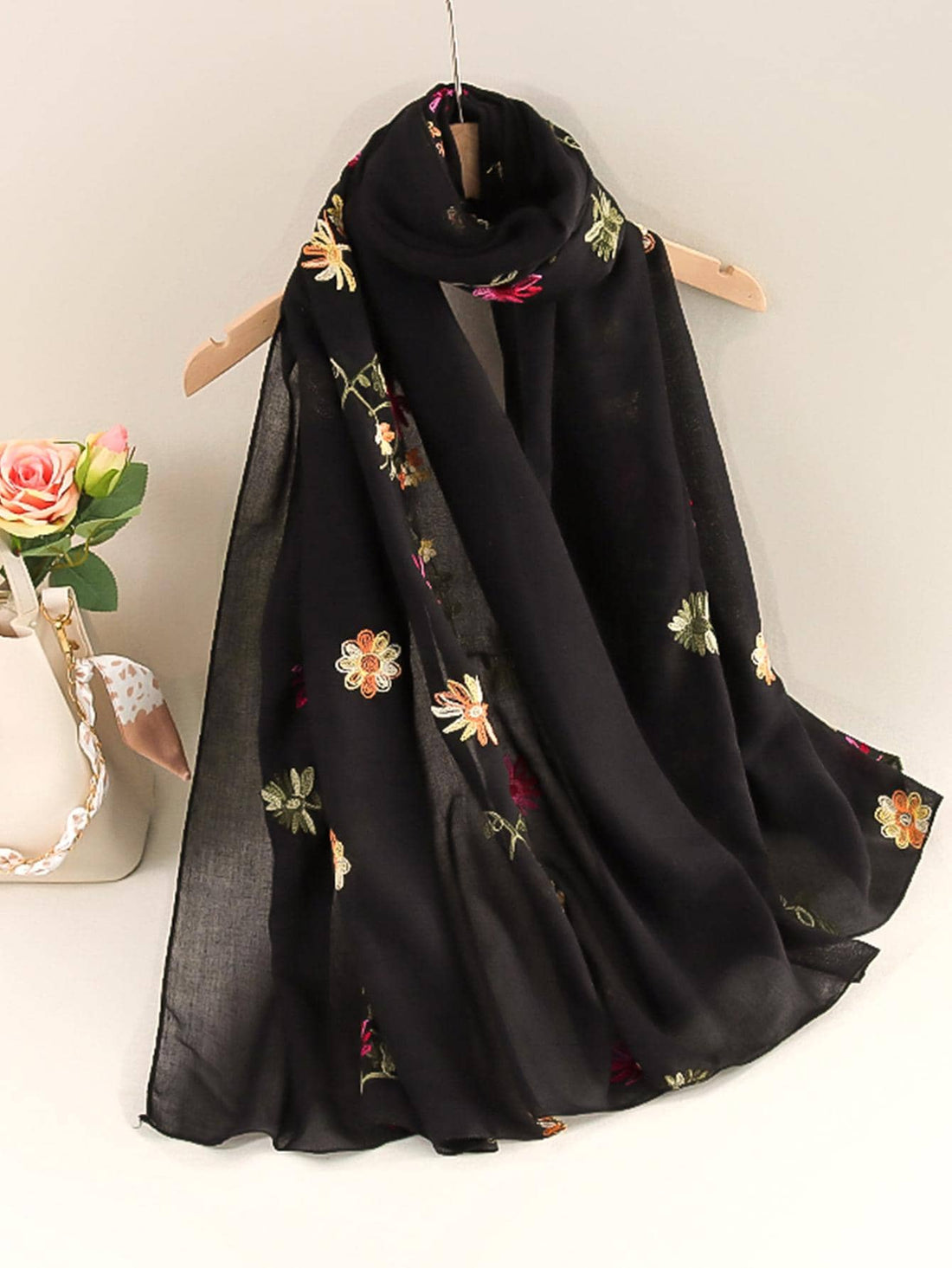 This Chic Embroidered Sunscreen Scarf is the perfect accessory for daily wear and work styles. It offers a stylish and practical solution for sun protection with its embroidered design. Made from high-quality material, it provides both fashion and function. Stay protected and fashionable with this scarf.