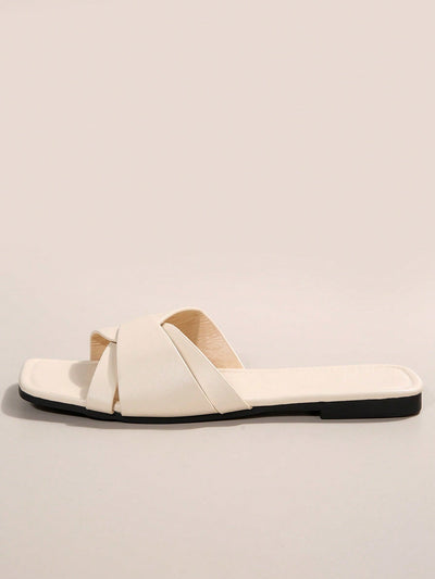 Chic Twist Detail Flat Sandals in Elegant Beige