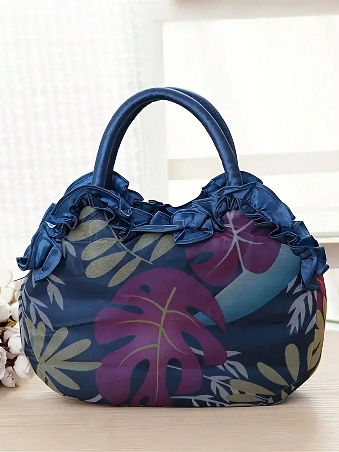 Introducing our Floral Bloom Drawstring Handbag - a must-have accessory for any fashion-forward individual. With its trendy design, simple drawstring closure, and cute floral pattern, this handbag is the perfect complement to any outfit. Its lightweight and convenient size make it ideal for everyday use.