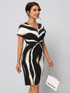 As an industry expert, our Colorblock Chic <a href="https://canaryhouze.com/collections/women-dresses" target="_blank" rel="noopener">dress</a> combines a chic colorblock design with a flattering twist front and split hem. In fact, this dress is designed to enhance your figure with a stylish and modern touch.