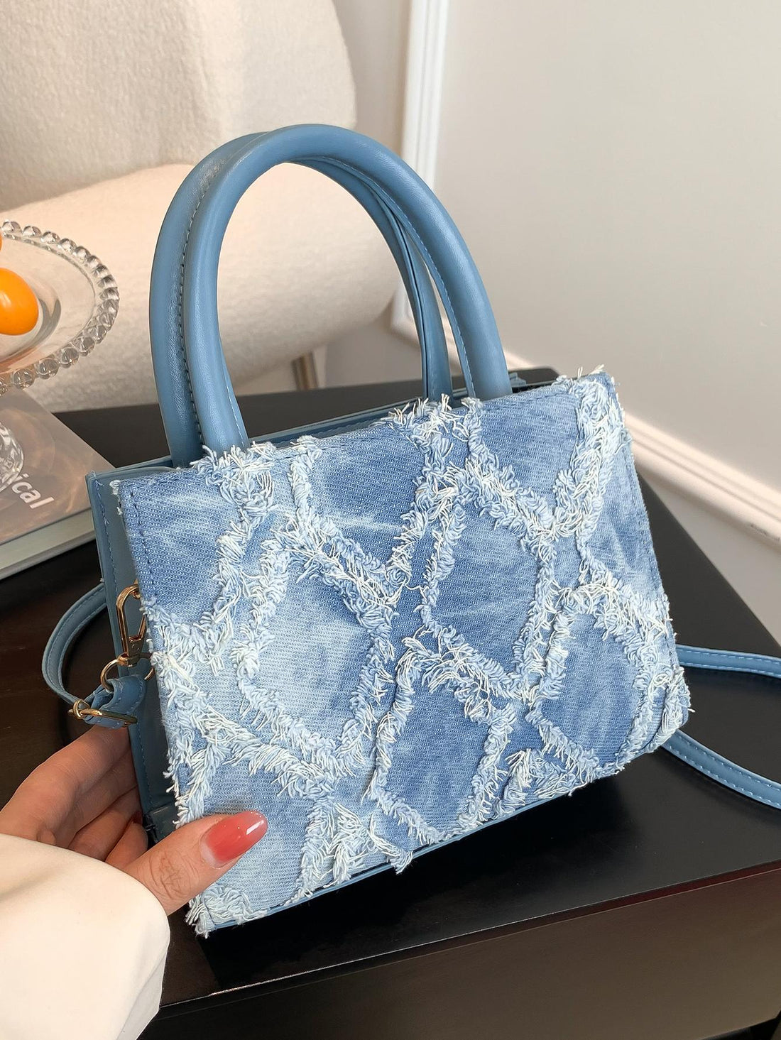 This chic fringed mini square <a href="https://canaryhouze.com/collections/canvas-tote-bags?sort_by=created-descending" target="_blank" rel="noopener">bag</a> is the ultimate casual shoulder statement. The compact size makes it perfect for everyday use, while the fringed design adds a touch of flair. Made with high-quality materials, this bag is both stylish and durable. Elevate your casual style with this statement bag.