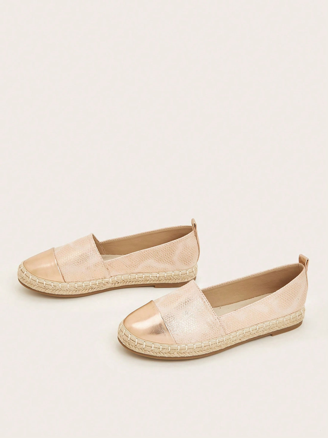 Discover the perfect combination of style and comfort with our Chic and Comfortable Metallic Detail Espadrille <a href="https://canaryhouze.com/collections/women-canvas-shoes?sort_by=created-descending" target="_blank" rel="noopener">Flats</a>. These flats feature a trendy metallic detail, elevated espadrille design, and plush cushioned sole for all-day wear on your next vacation adventure. Elevate your shoe game and stay comfortable while exploring your destination.