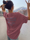 Empowerment in Print: Slogan Graphic Drop Shoulder Tee