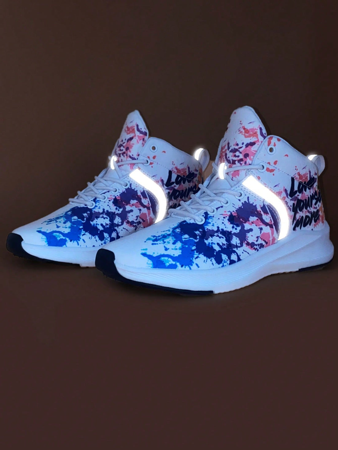 Elevate your fashion game with our Letter Graphic Lace-up Front Running Shoes. Designed for both style and function, these shoes are perfect for adding a trendy touch to your workout or daily wear. The lace-up front ensures a secure fit, while the letter graphic adds a unique touch.