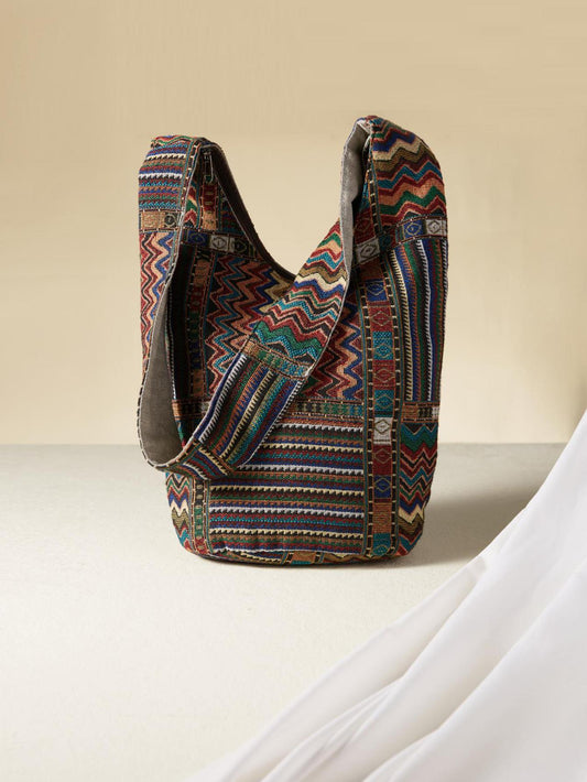 Experience the ultimate in travel convenience with our Bohemian Dream shoulder <a href="https://canaryhouze.com/collections/canvas-tote-bags?sort_by=created-descending" target="_blank" rel="noopener">bag</a>. With its spacious interior, you can pack everything you need in style. Expertly crafted for the modern traveler, this bag boasts a large capacity while adding a touch of bohemian flair to your wardrobe.