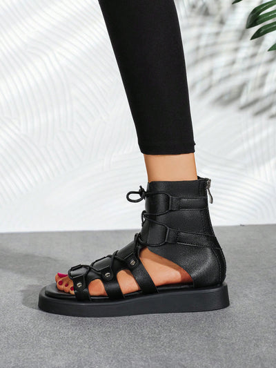 Black Lace-Up Gladiator Sandal Boots with Studded Decor and Hollow-Out Design - Fashionable Footwear for Outdoor Adventures