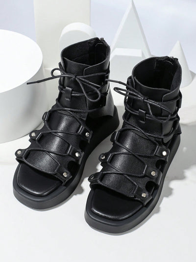 Black Lace-Up Gladiator Sandal Boots with Studded Decor and Hollow-Out Design - Fashionable Footwear for Outdoor Adventures